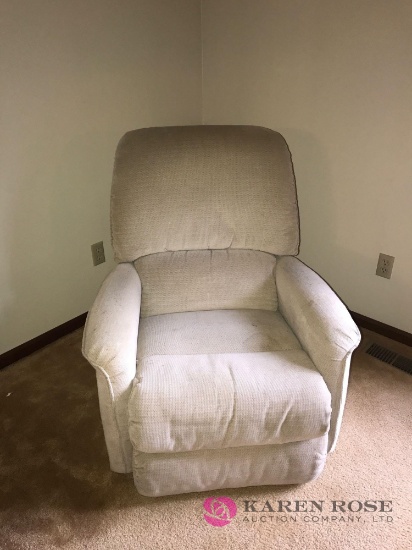 Creamy colored Rocker recliner chair