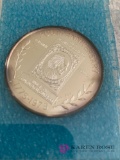 Three sterling silver medals, 1964 Canadian Silver Dollar yeah