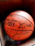 Autographed basketball in case (upstairs bedroom)