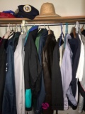 Closet with coats and shirts- hats