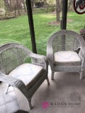 2- white wicker chairs