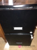 Black file cabinet with key