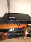 Cabinet with coby 35 inch tv- Panasonic vhs-magnavox vhs- DVDs- Sony hi girls stereo