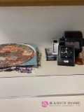 Rolodex, clock , scale, placemats