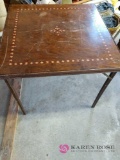 Vintage creeper and 28-in x 28-in vintage card table