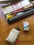 Gun cleaning kit and bullets