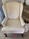 Cream colored wing back chair
