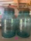 Two blue mason jar bottles