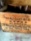 Vintage advertisement crate with glass bottles