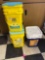 Three tubs of cat litter in rec room