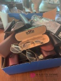 Large lot of reading glasses and sunglasses