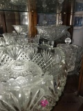 Shelf of crystal glassware bowls/ creamers/butter dishes