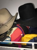 Top shelf of casual hats/cowboy hats