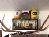 Top shelf including diorama, rack, and hats BR3
