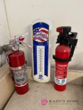 NAPA thermometer and 2 fire Extinguishers in rec room