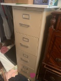 Four drawer file cabinet