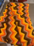 Orange and brown knitted blanket B1