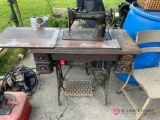 Vintage singer sewing machine. Garage location