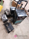 Battery charger and batteries. Barn location