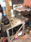 Band saw on wooden stand