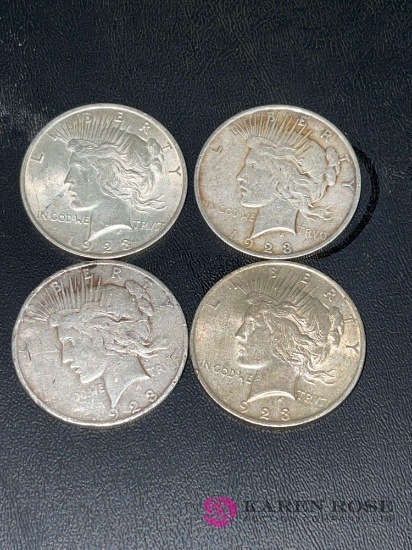 Lot of four 1923 piece silver dollars
