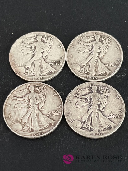 Lot of four walking liberty halves