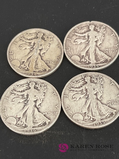 Lot of four walking liberty halves