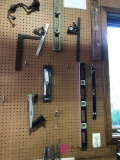 Assorted tools levels/hammers/drill bits/crow bar/