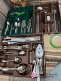 Three sets of stainless flatware