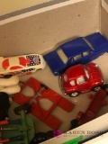 Assorted plastic dolls/cars and bears