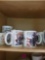 K - Shelves of Mugs