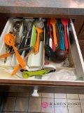 Contents of kitchen drawer left of sink kitchen utensils