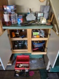 Cabinet with contents including knife sharpener