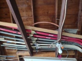 Garage loft contents including skis and poles