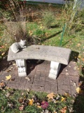 Concrete bench with concrete cat