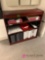 Bookcase with office supplies in/check out office area