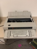 IBM electric typewriter in/out office area