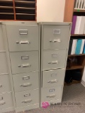 two 4drawer file cabinets N/check out area