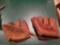 two vintage baseball mitts. BS