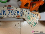 Garage lot of assorted collectible license plates