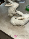 Garage pair of small cast iron rabbits