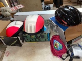 Garage,Three bicycle helmets