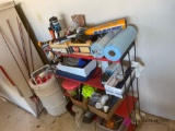 Garage Metal shelf with contents and bucket