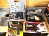 Black & Decker vintage 1/4 inch drill, rechargeable drill driver, angle grinder, and glue gun. BS