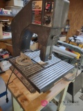 Craftsman 10-in bandsaw on cart. BS