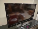 42-in LG TV with remote. BS