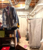 All items straight in basement storage room to the right hanging clothes