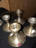 4- Sterling candle stick holders