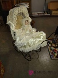 vintage doll buggy with doll