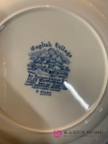 Eight blue English Village plates